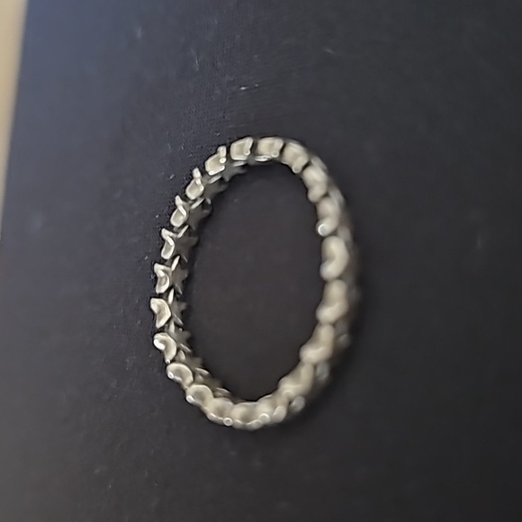 Sterling silver ring with stars all the way around the band. Infinity star band - Picture 3 of 4